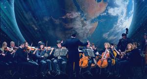 Conductor Steven Price on stage in front of orchestra